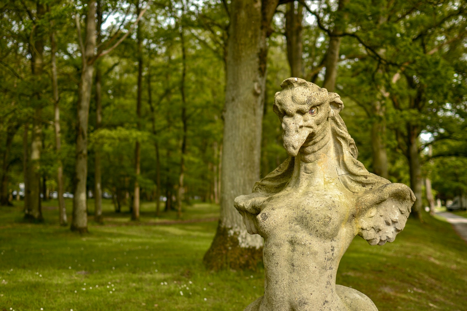 bird with human body and wings statuette